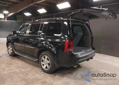 2010 Honda Pilot Touring z USA, uszkodzony, nr VIN 5FNYF4H9XAB005365